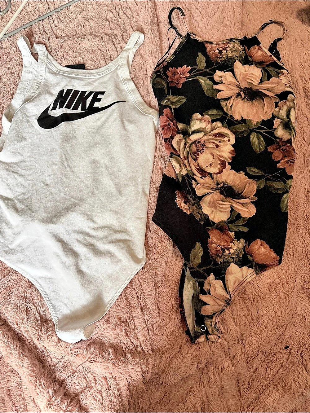 Size small both. Nike and Windsor